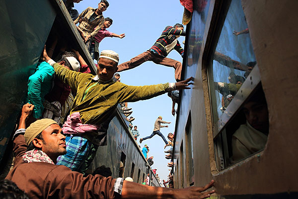 Photograph Noor Ahmed Gelal Jumping Between The Trains on One Eyeland